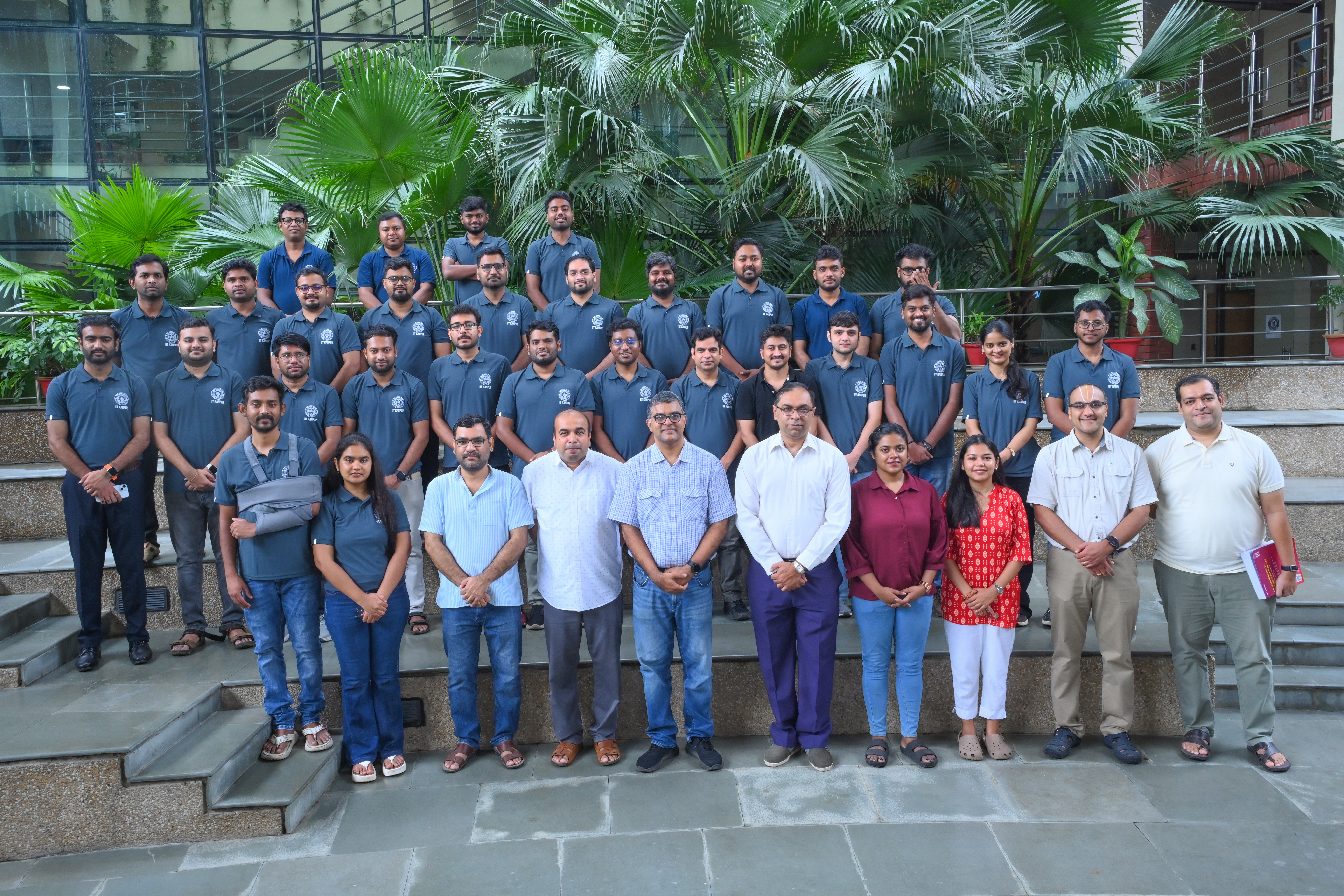 Cohort photograph — 19th batch on the Faculty Building steps